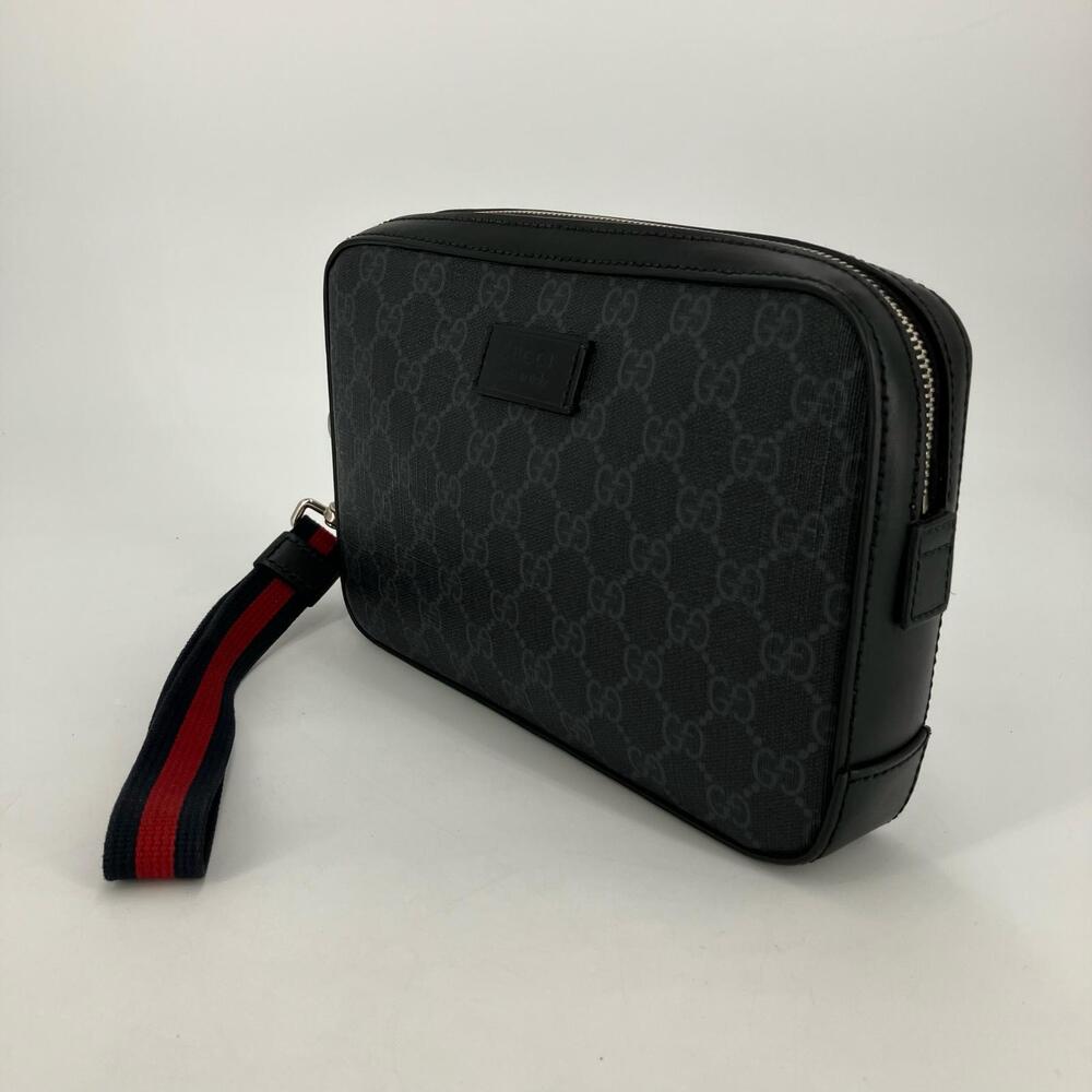 Gucci black GG Supreme canvas leather clutch Web